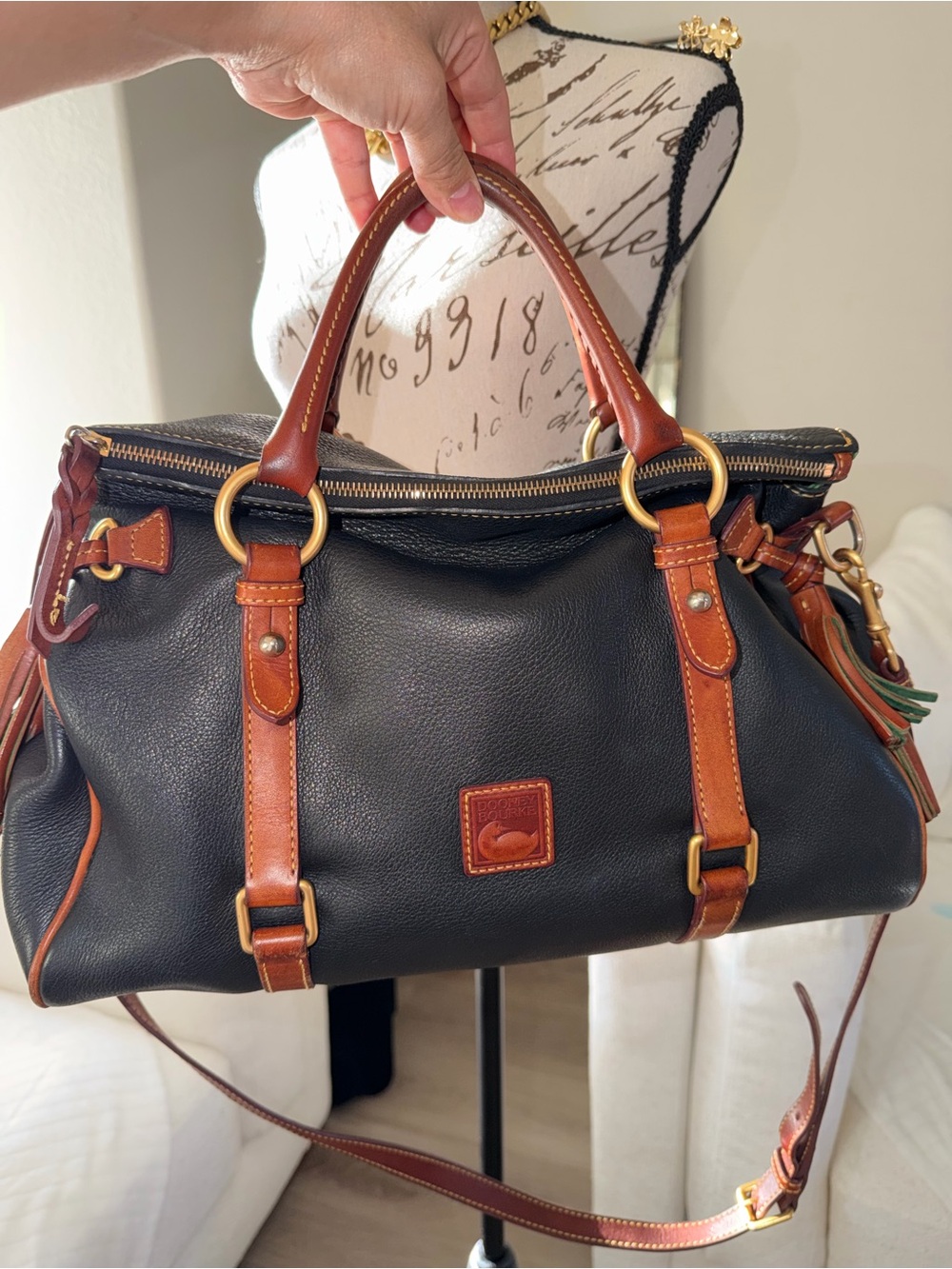 Dooney & Bourke Black Leather Satchel with Brown Trim and Gold Hardware